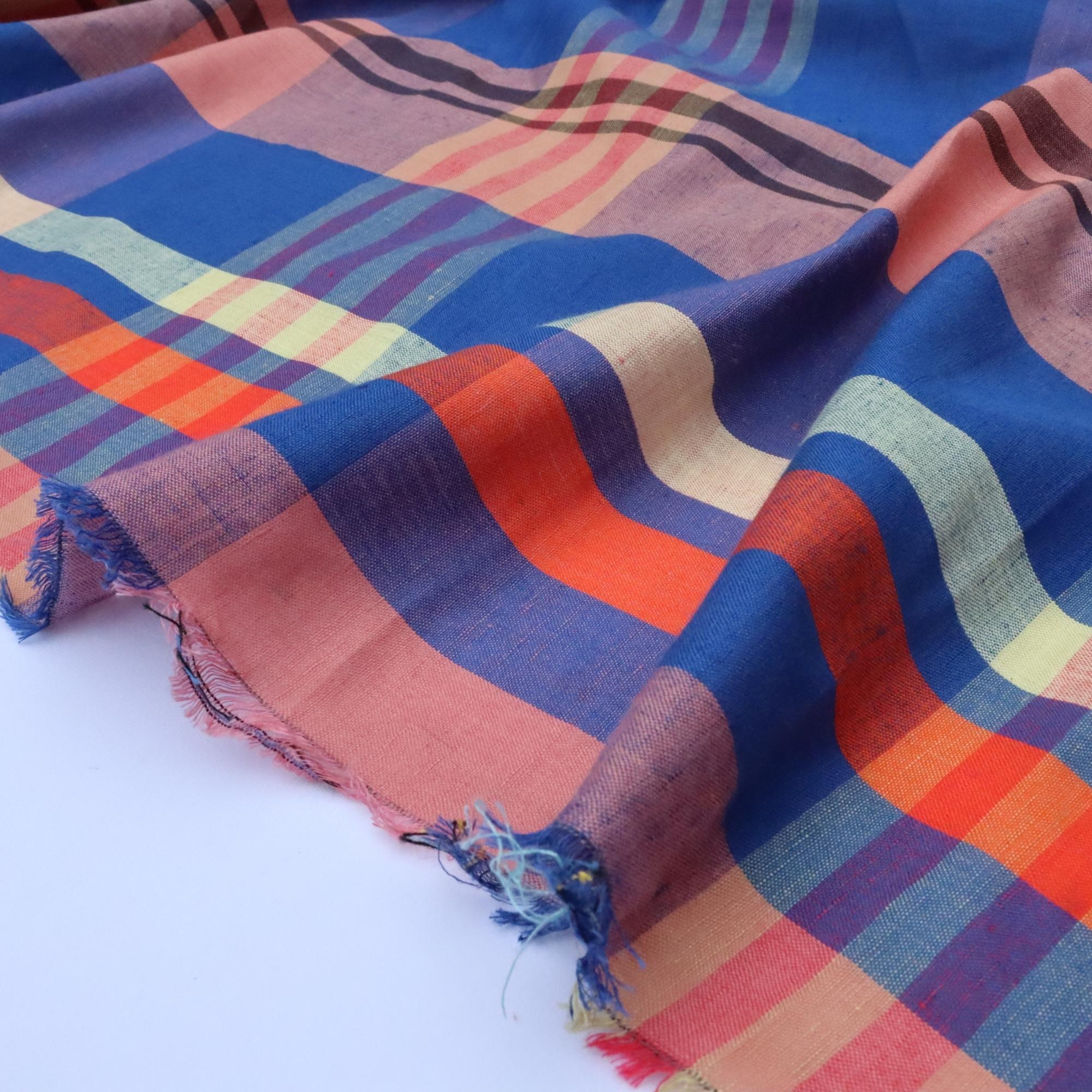 Colorful fabric with wavy pattern on a white background