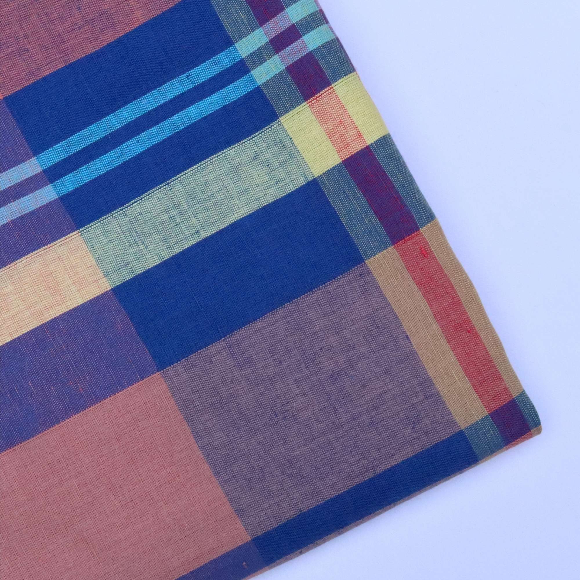 Colorful plaid fabric with a checkered pattern on a white background