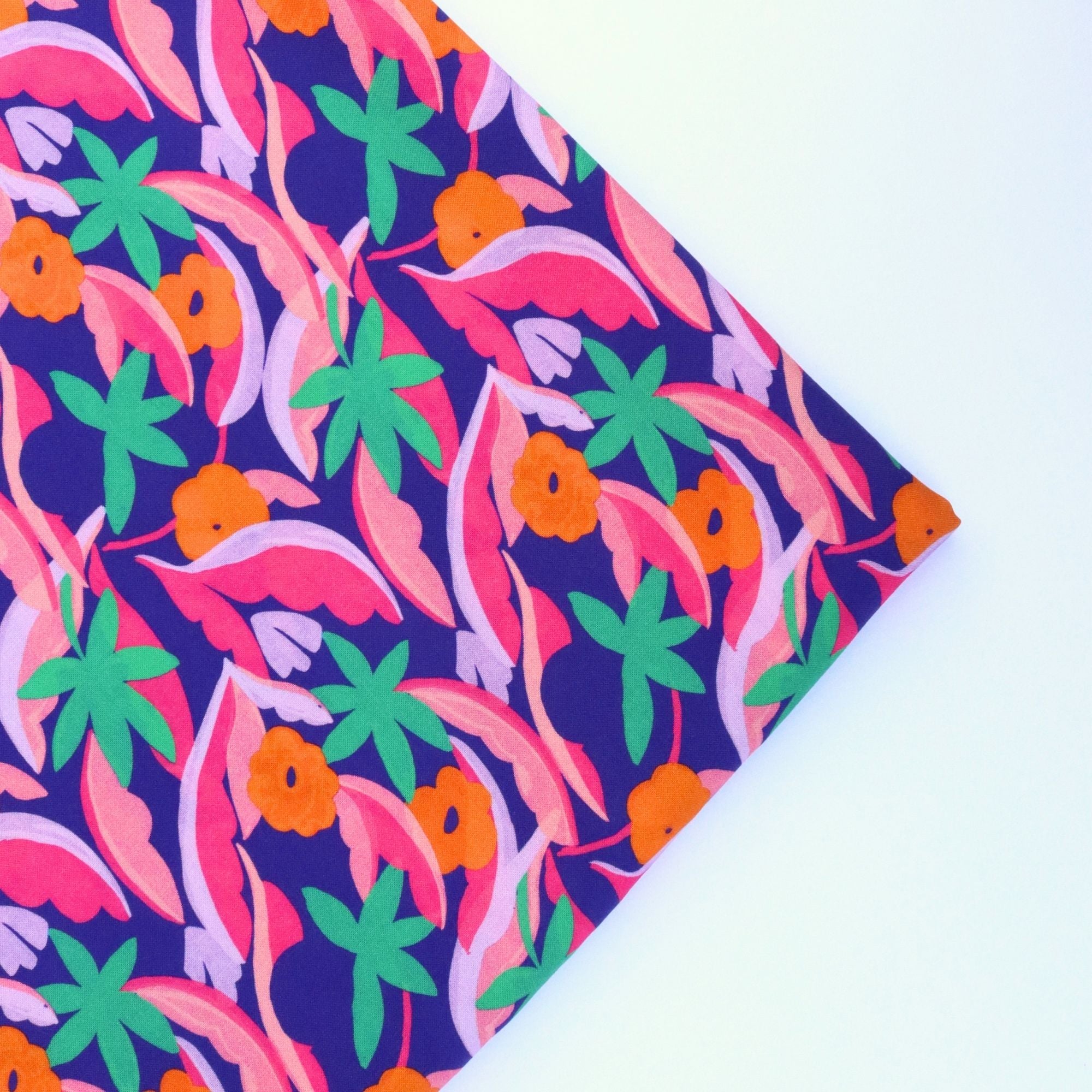 Colorful fabric with a tropical pattern on a white background