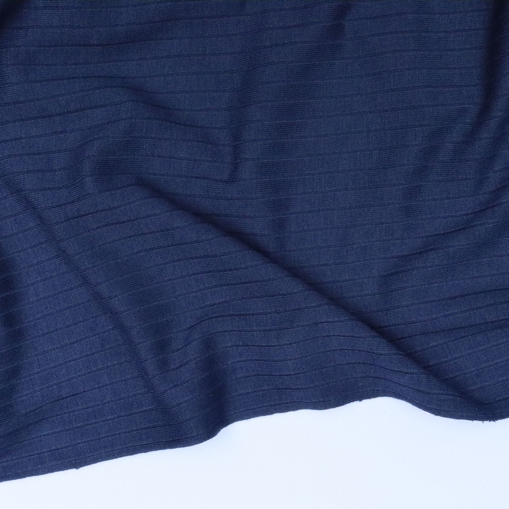 Close-up of blue textured fabric with a white base