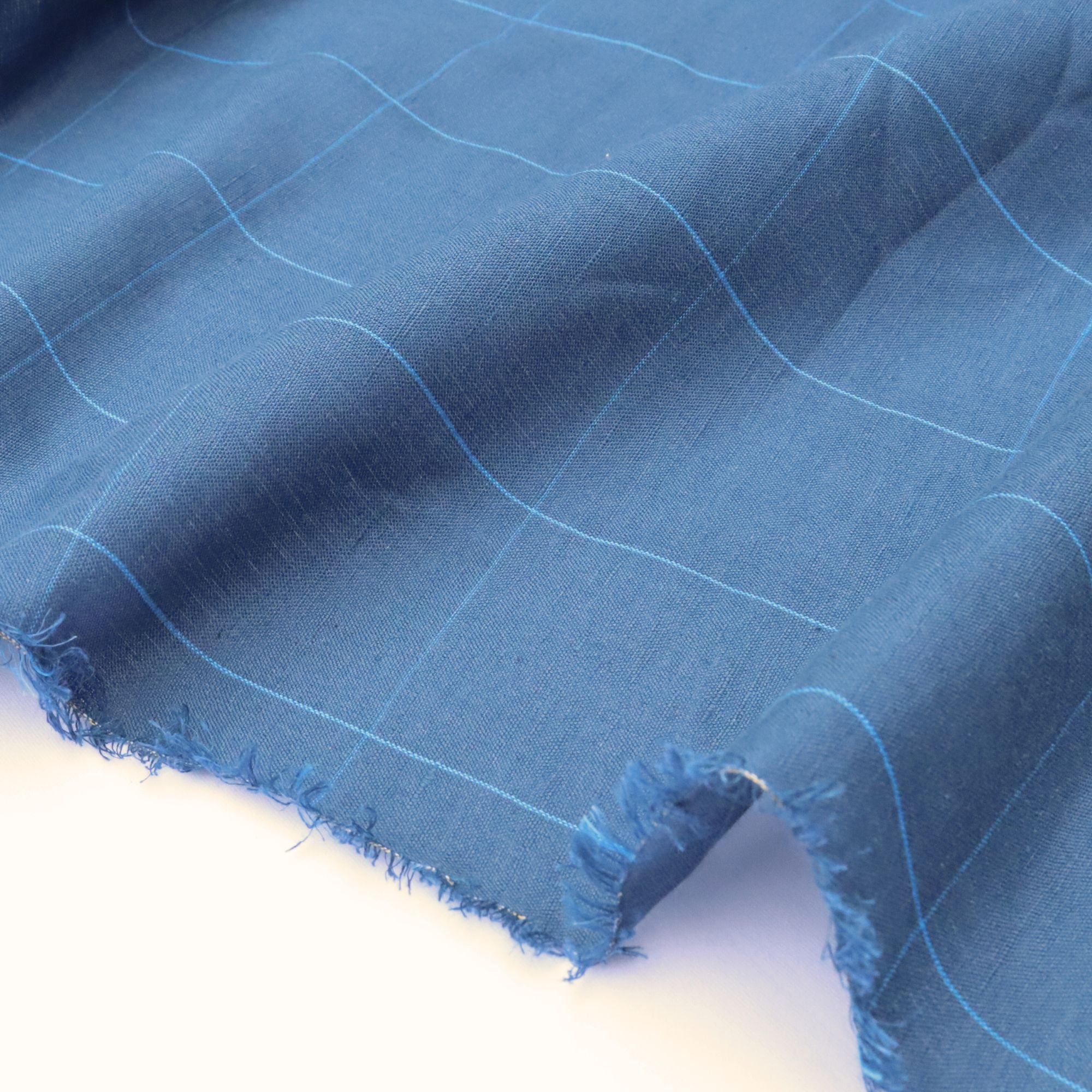 navy blue cotton linen with large checks laid out