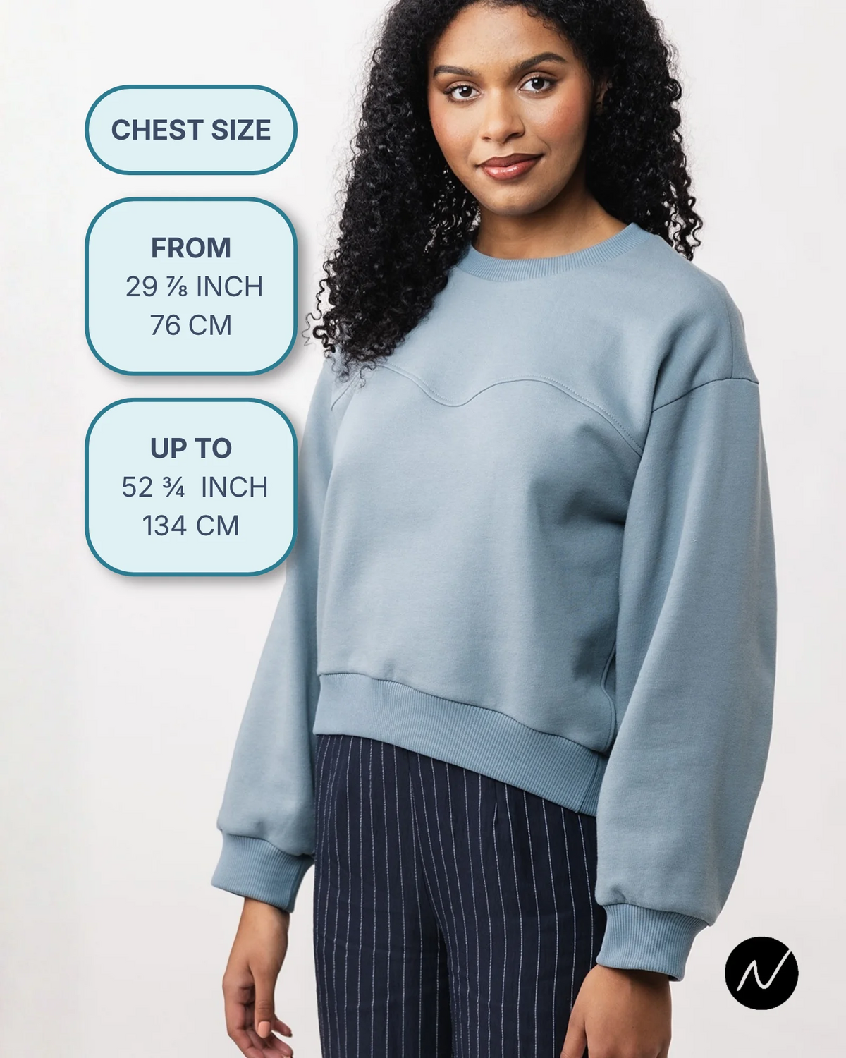 Woman wearing blue sweatshirt from named clothing, a PDF sewing pattern