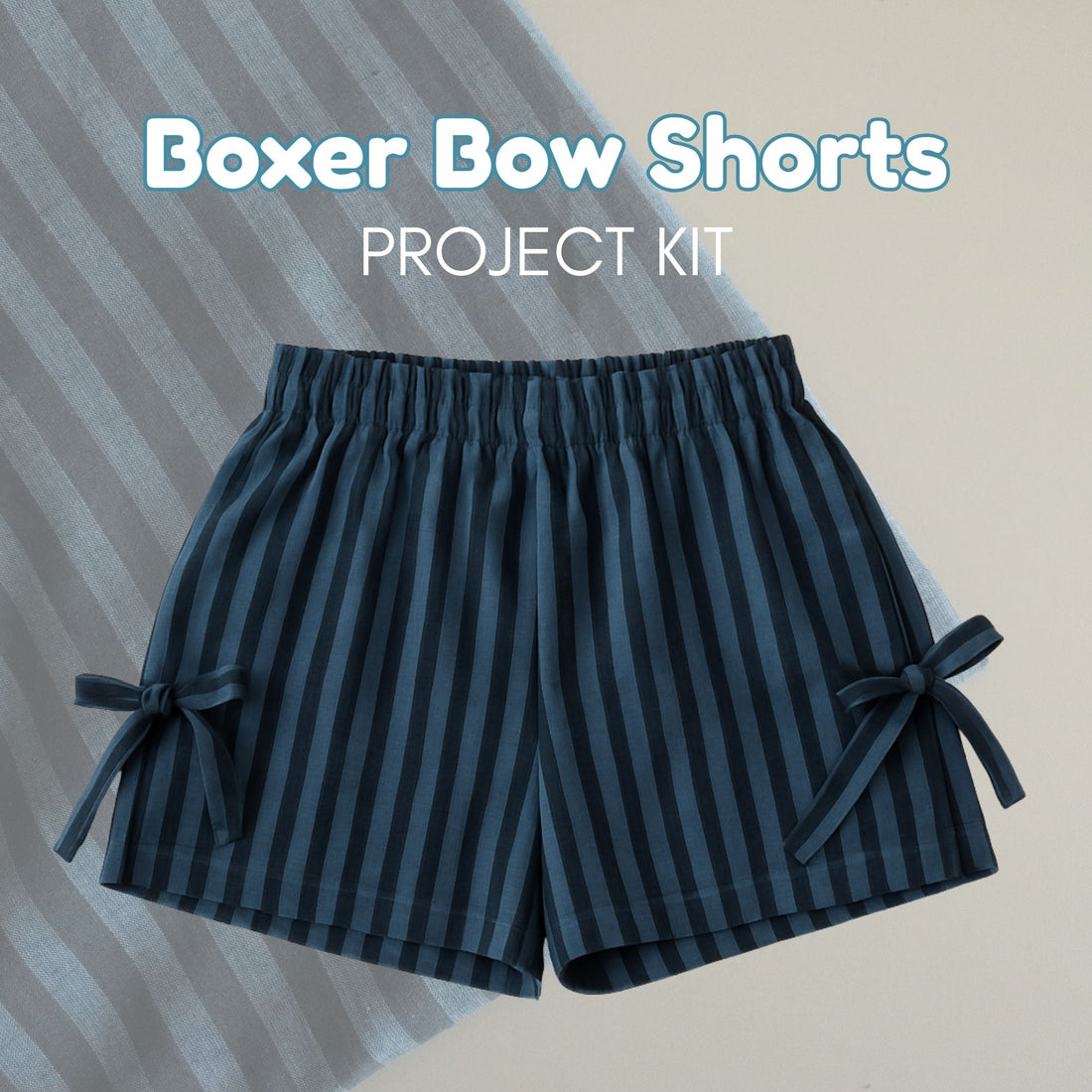 Striped boxer bow shorts on a striped background with text &