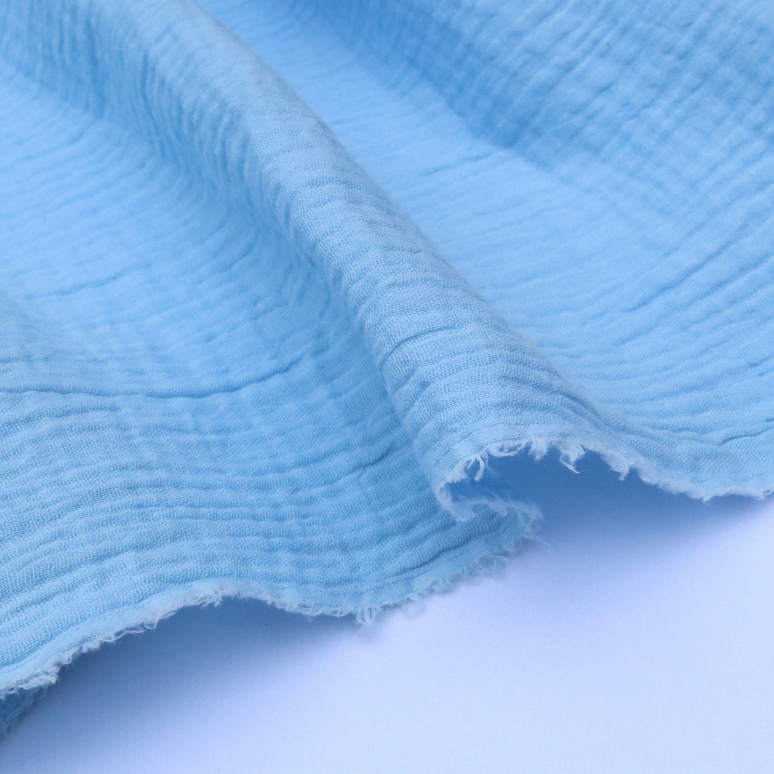 Close-up of textured blue fabric
