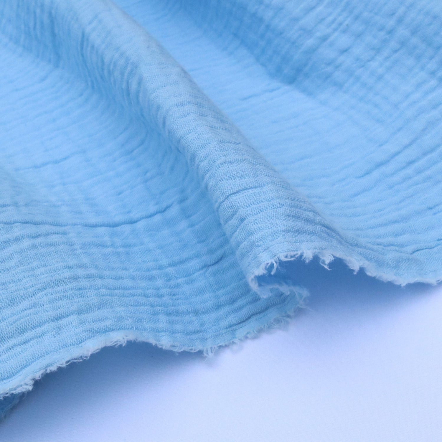 Close-up of textured blue fabric