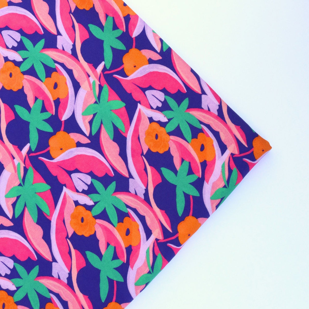 Colorful fabric with a tropical pattern on a white background
