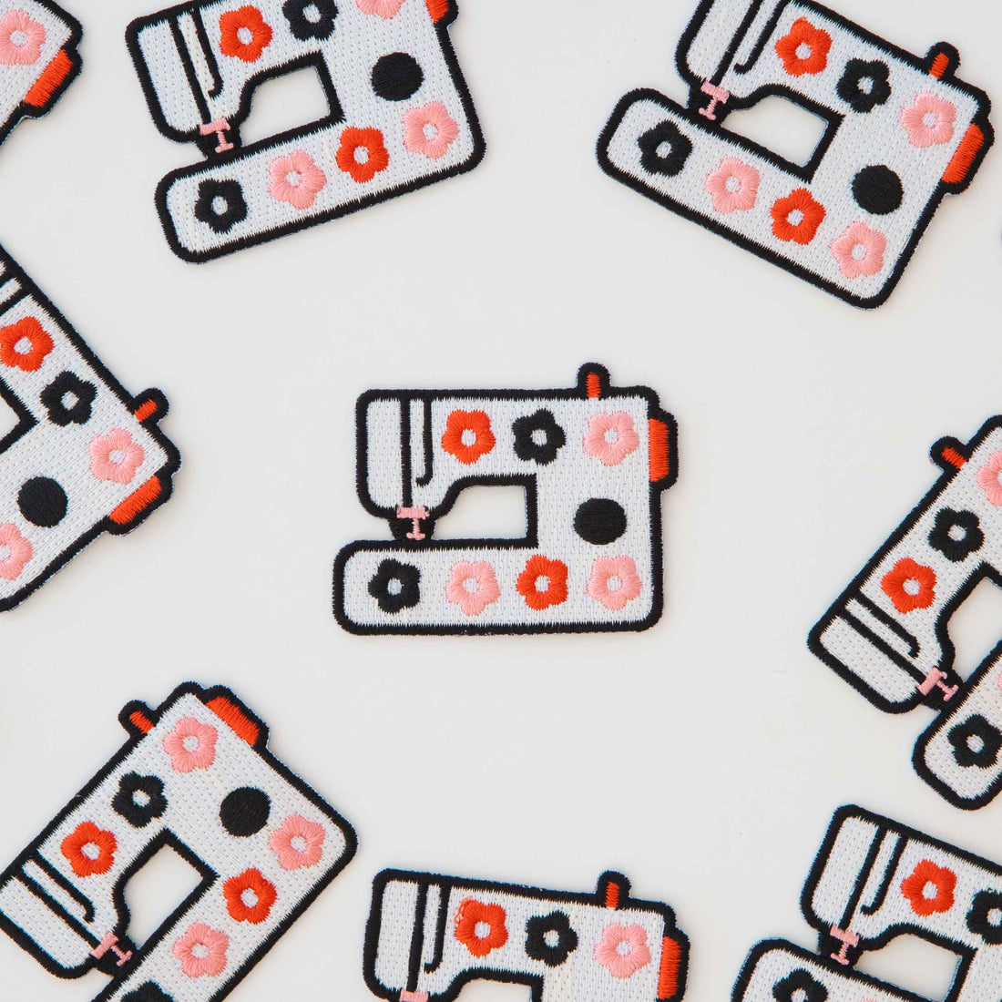 Sewing Machine Iron on Patches laid out around each other by Sarah Hearts