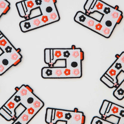 Sewing Machine Iron on Patches laid out around each other by Sarah Hearts