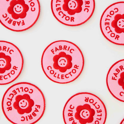 Multiple Iron on Patches for Fabric Collectors laid out around each other. The iron on patch saying &