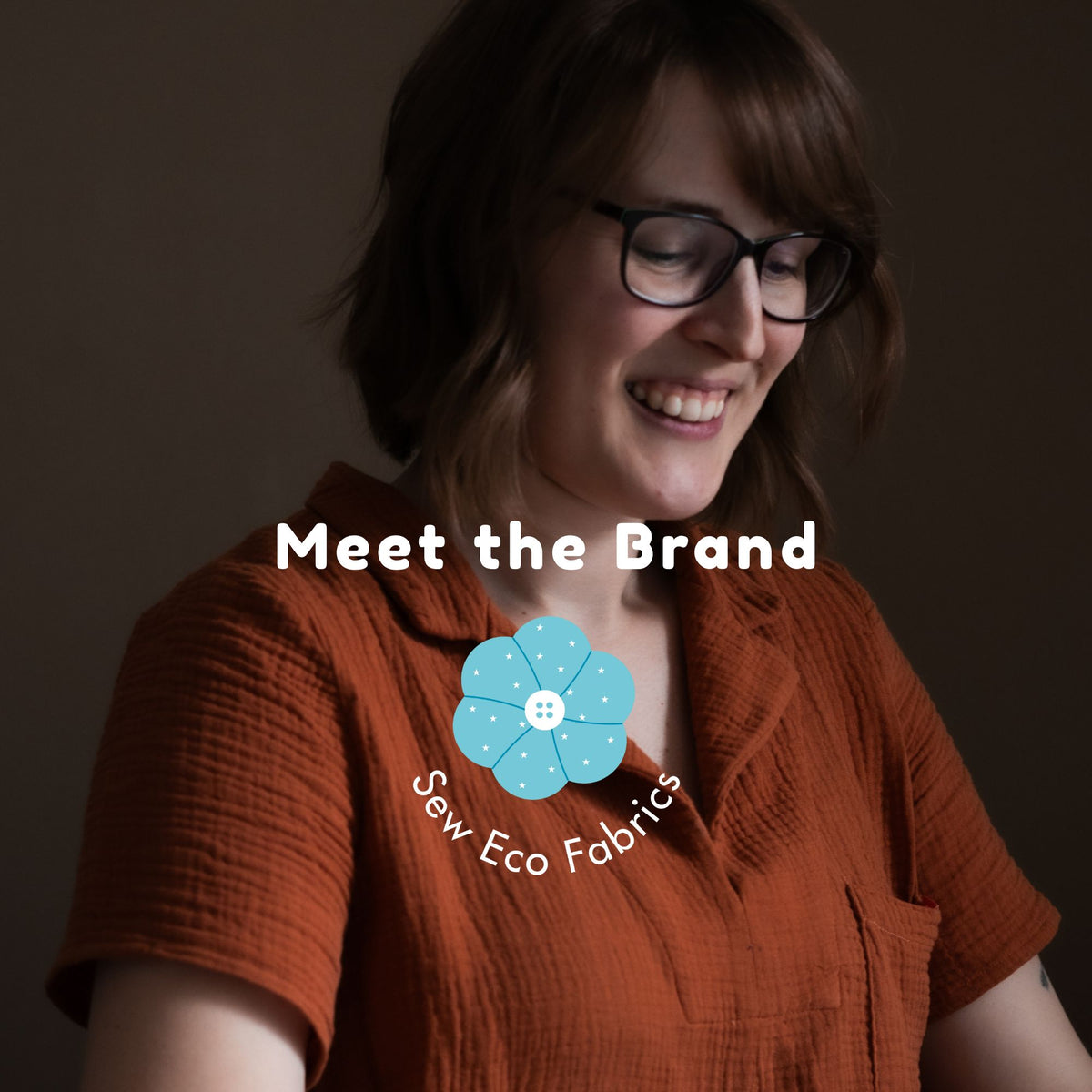 Woman wearing glasses and an orange shirt with 'Meet the Brand' text and logo on a dark background