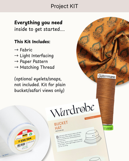 Project kit contents for making a bucket hat, including fabric, thread, paper pattern, and instructions, with a close-up of the orange paisley fabric and a spool of Gutermann brown thread.