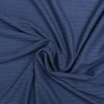 Close-up of blue fabric with a textured pattern