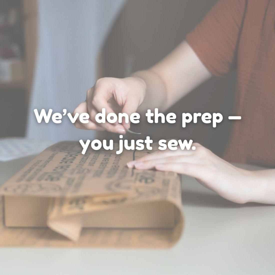 wrapping up a Kit box in tissue paper with text overlay &