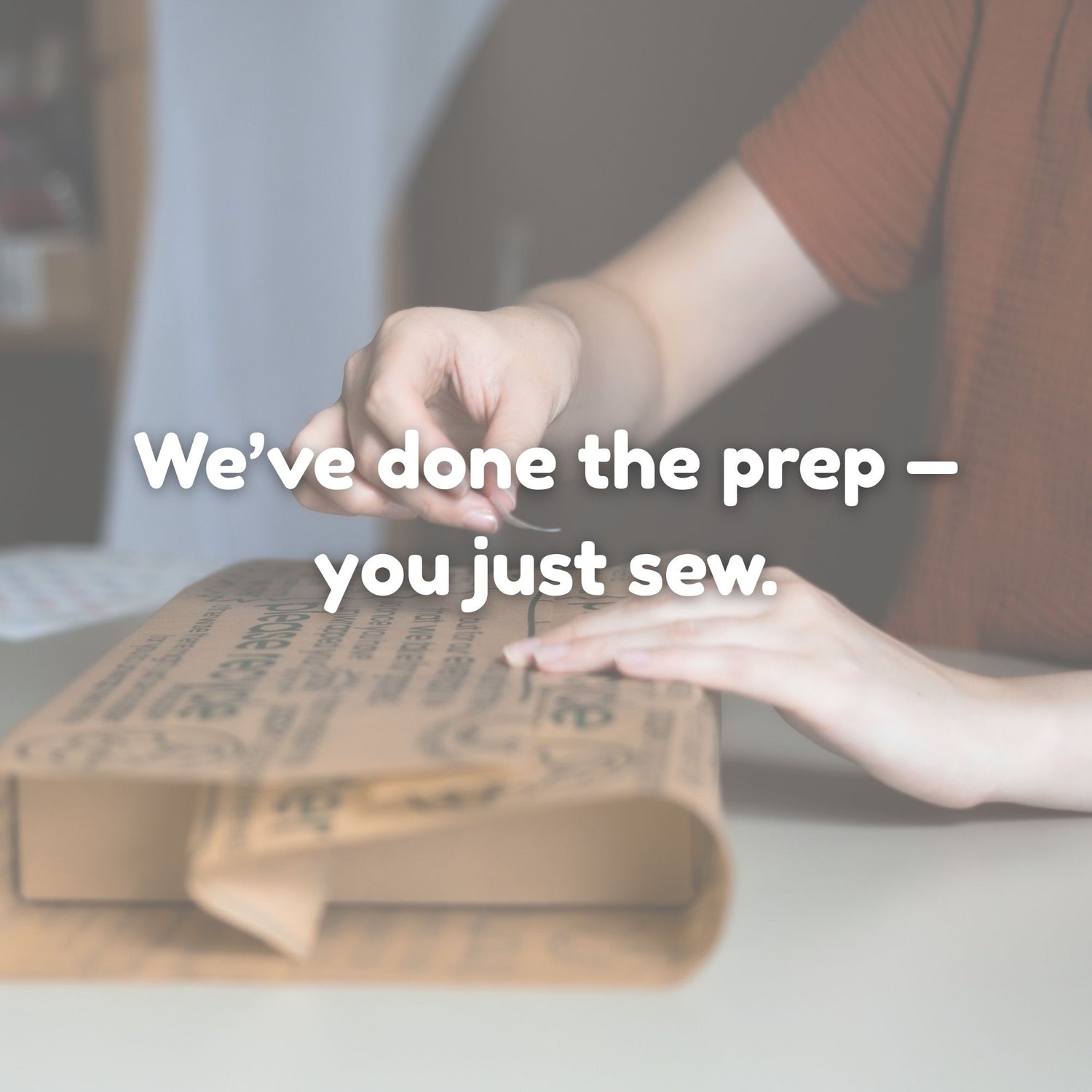 wrapping up a Kit box in tissue paper with text overlay &