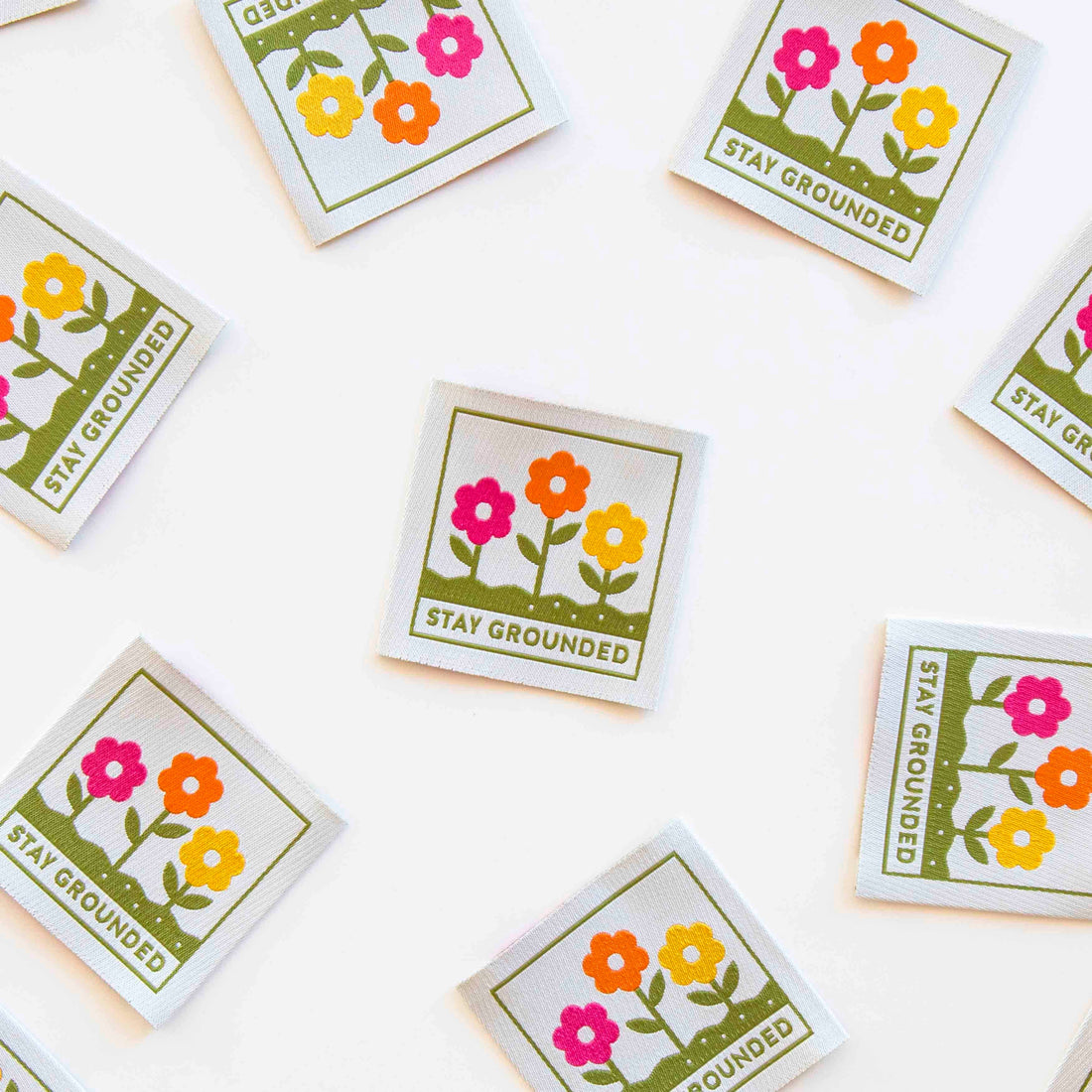 Sew in Labels with floral design and &