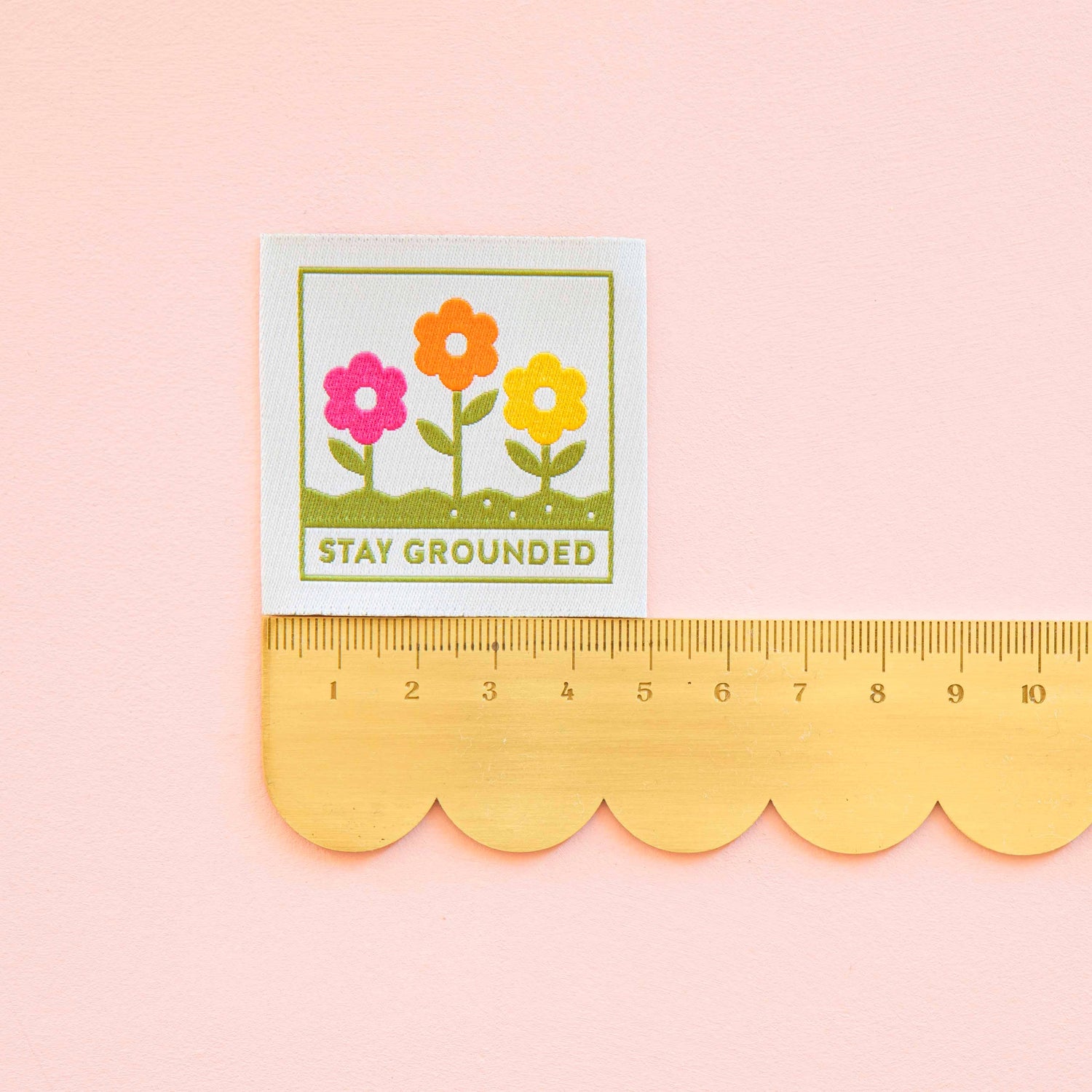Colourful flower label with &
