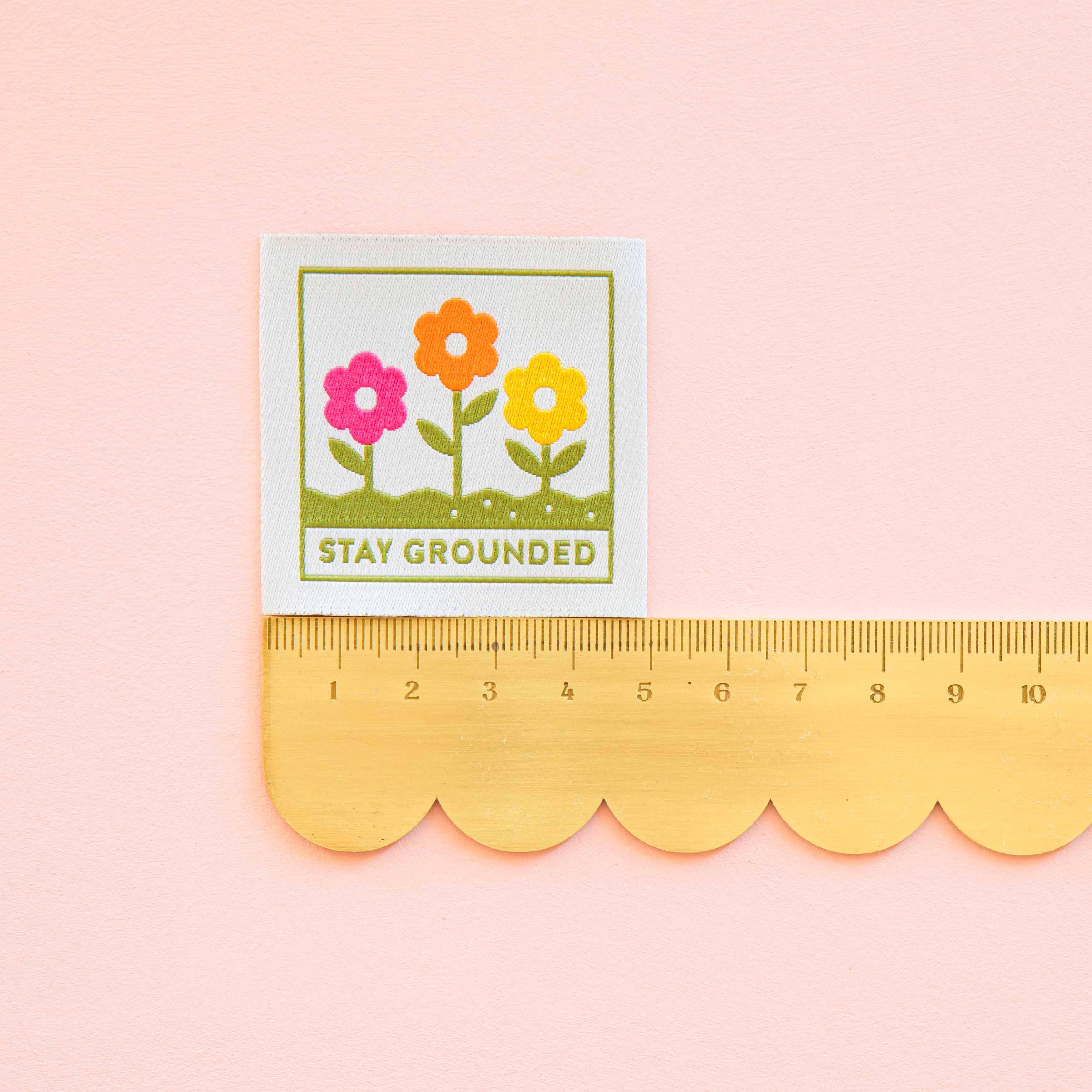 Colourful flower label with &