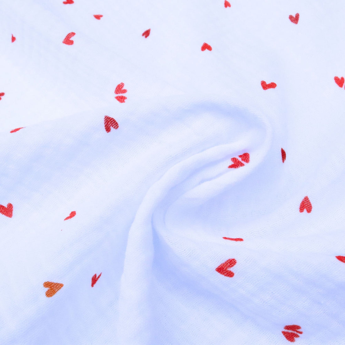 White Double Gauze Cotton fabric with red hearts pattern