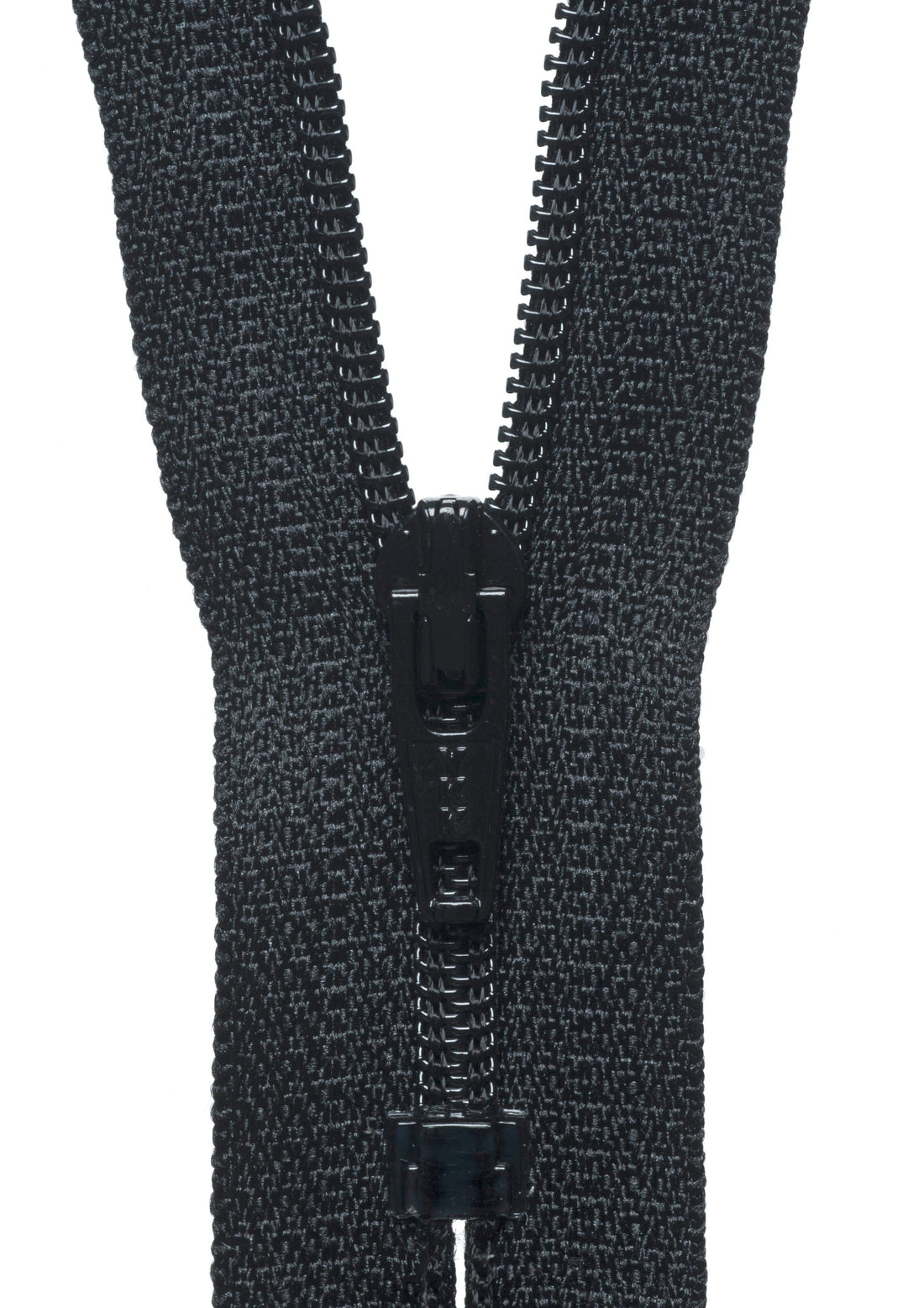 Close-up of a black zipper on a white background