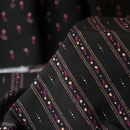 Bloom Everyday Stripes viscose fabric spread out, featuring both stripe and scattered tulip sections