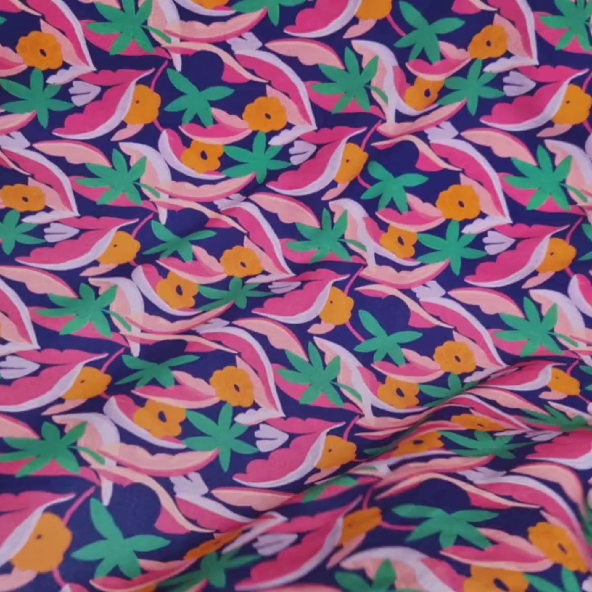 video showing a colourful floral viscose fabric draping and moving