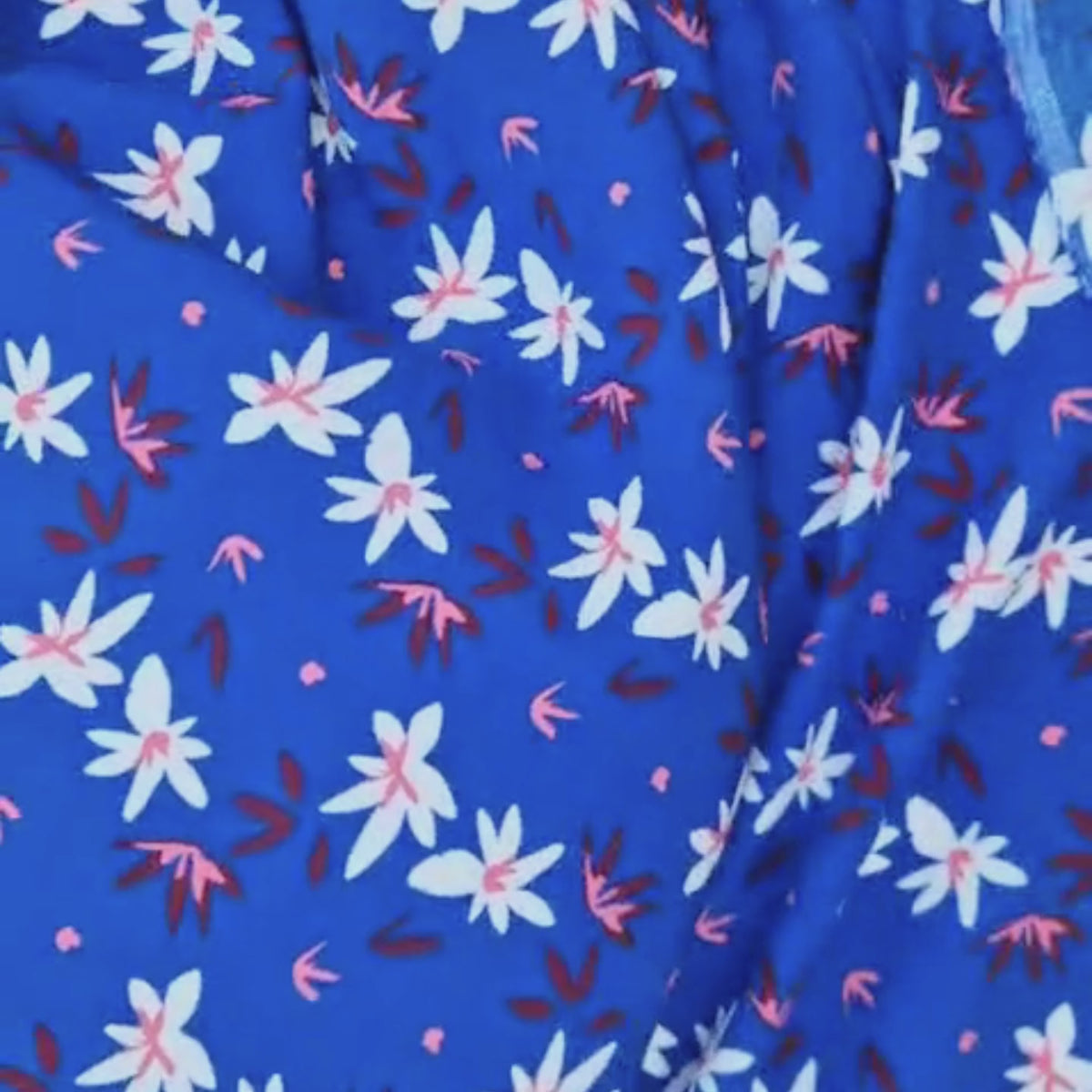 Video of the floral blue viscose moving and up close design