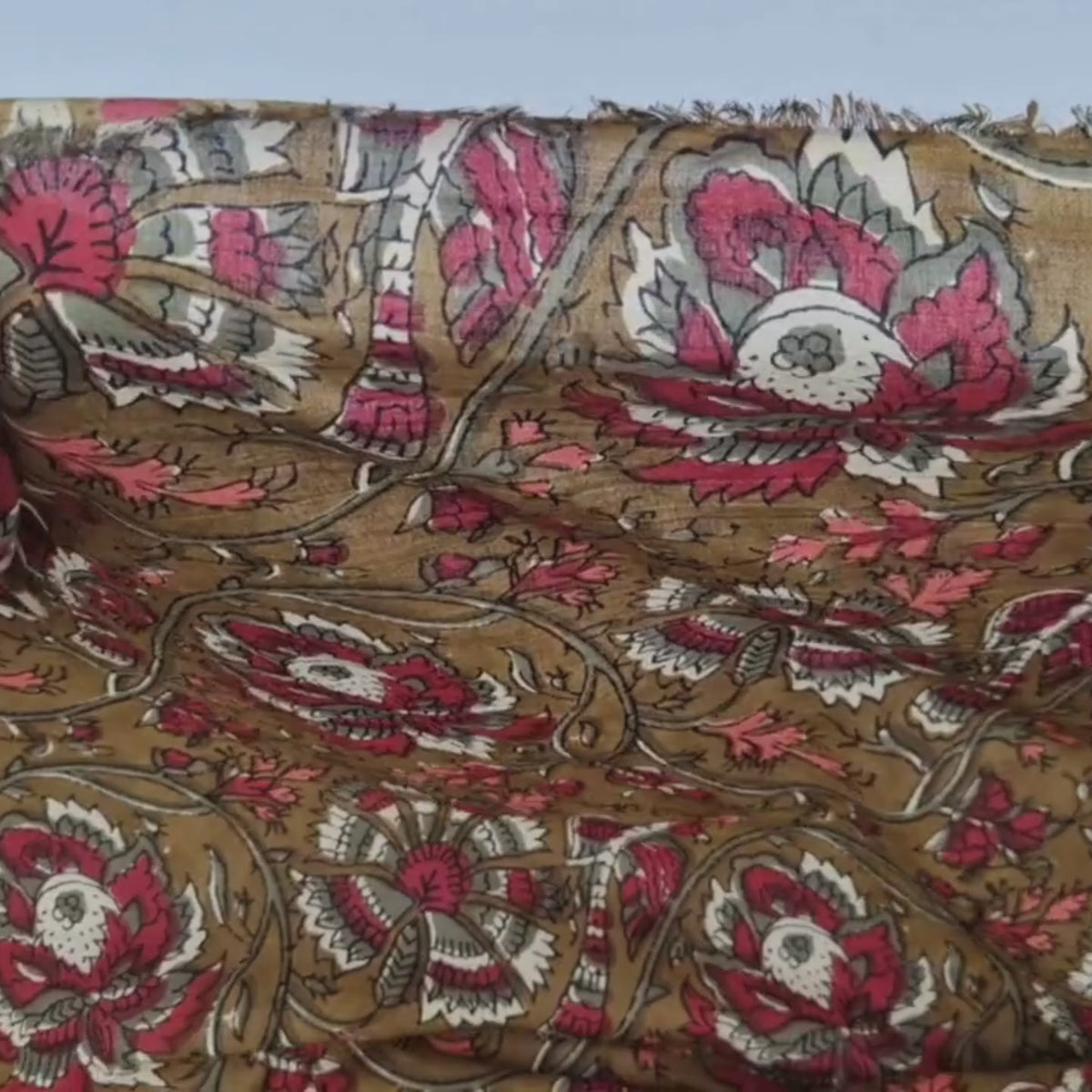 Video of the Olive Wine Indian Cotton showing the movement and up close texture
